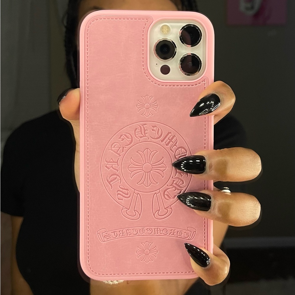 Pink CH inspired iPhone 13 Pro case.